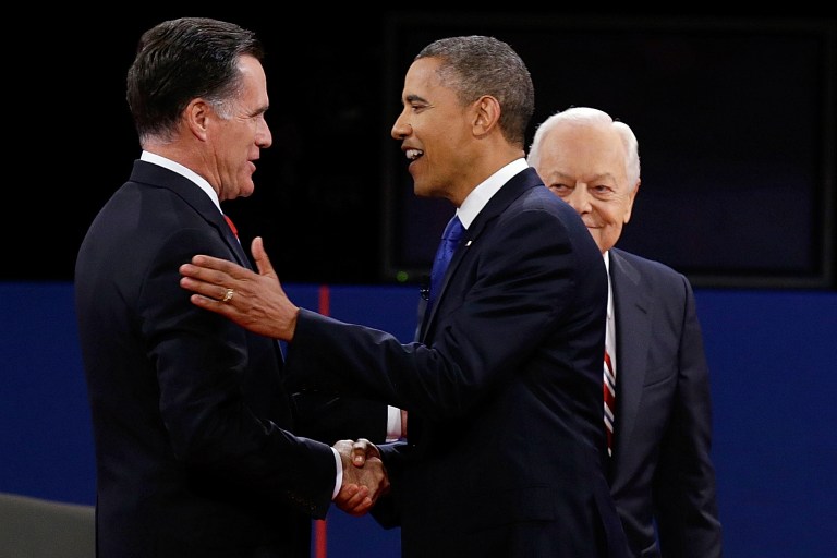 President Obama will speak about health care in Massachusetts, where then-Gov. Mitt Romney implemented a health care law that was considered a model for Obamacare. (AP File)