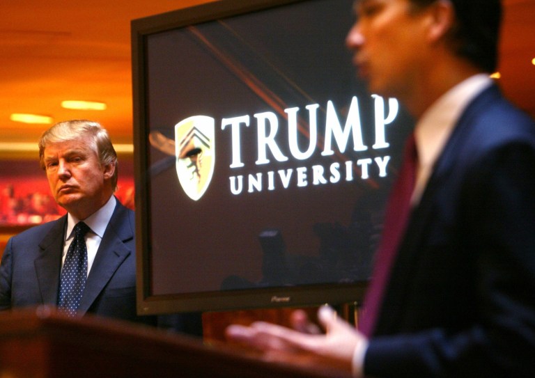 A federal judge issued an initial sign-off on Tuesday evening of a $25 million settlement between President-elect Donald Trump and parties suing his Trump University real estate school. (AP Photo/Bebeto Matthews)
