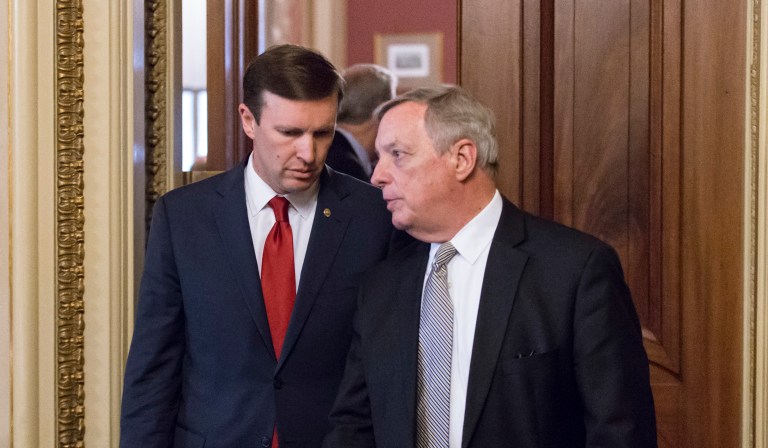 Sen. Chris Murphy, D-Conn., (left) led the charge for legislation that would prohibit people on terrorist watch lists from purchasing firearms. (AP Photo/J. Scott Applewhite)
