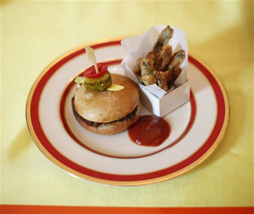   Food plate sits out as an example of the meal guest will eat at the first ever Kidsâ âState Dinnerâ luncheon, hosted by first lady Michelle Obama, in the East Room of the White House, Monday, Aug. 20, 2012 in Washington. The plate is Yummy Cabbage Sloppy Joes and Baked Zucchini Fries. (AP Photo/Pablo Martinez Monsivais)