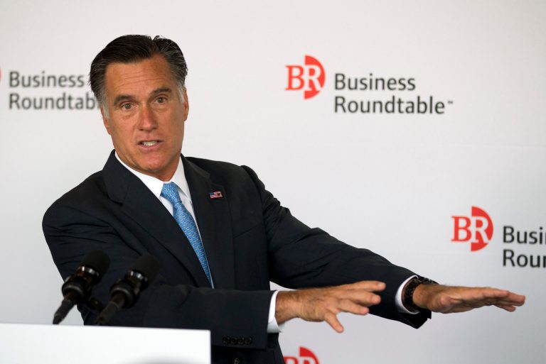   In this June 13, 2012, photo, Republican presidential candidate, former Massachusetts Gov. Mitt Romney speaks during the Business Roundtable quarterly meeting at the Newseum in Washington. Romneyâs frequent remarks about the nationâs unemployment problem have long included a curiosity, if not an outright contradiction: Itâs bad for private-sector workers to lose their jobs, he says, but itâs often good for government workers to do so. (AP Photo/Evan Vucci)  