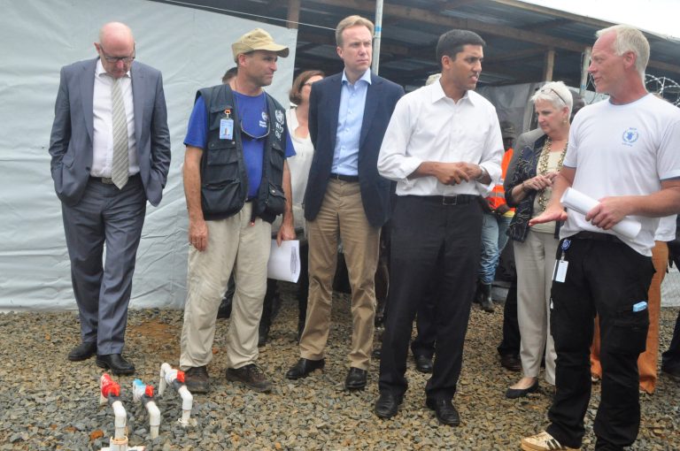 Head of  USAID, Rajiv Shah, second, right, inspects a newly built Ebola treatment centre in Monrovia, Liberia. Tuesday, Oct. 14, 2014. The Ebola outbreak that was first identified in March has devastated Guinea, Liberia and Sierra Leone. More than 4,400 deaths have been linked to Ebola so far and even that may be an underestimate, according to the World Health Organization. (AP Photo/Abbas Dulleh)