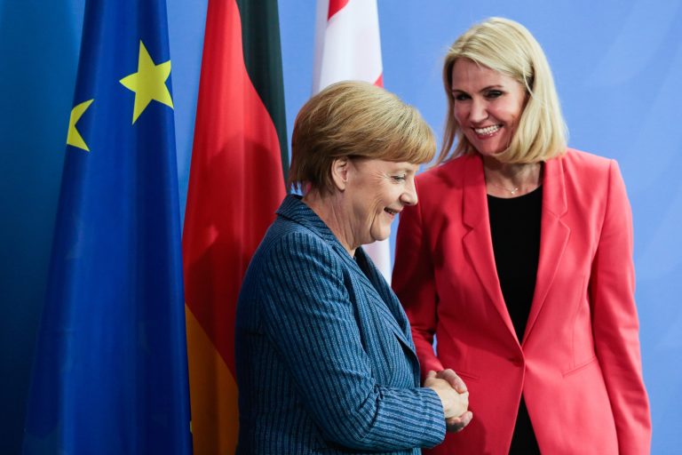 German Chancellor Angela Merkel shakes hands with the Prime Minister of Denmark Helle Thorning-Schmidt, right,  after a meeting at the chancellery in Berlin, Thursday, June 19, 2014. (AP Photo/Markus Schreiber)