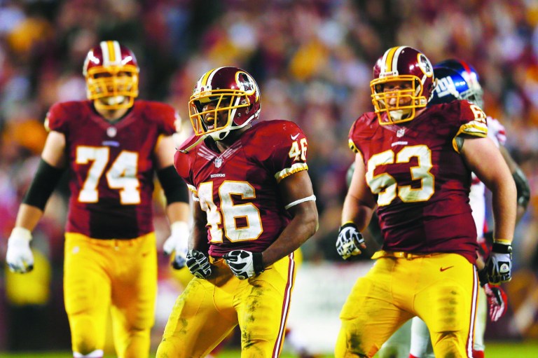 Rob Carr/Getty Images
Alfred Morris ran for 124 yards during the Redskins' win on Monday night and now has 1,106 rushing yards this season.