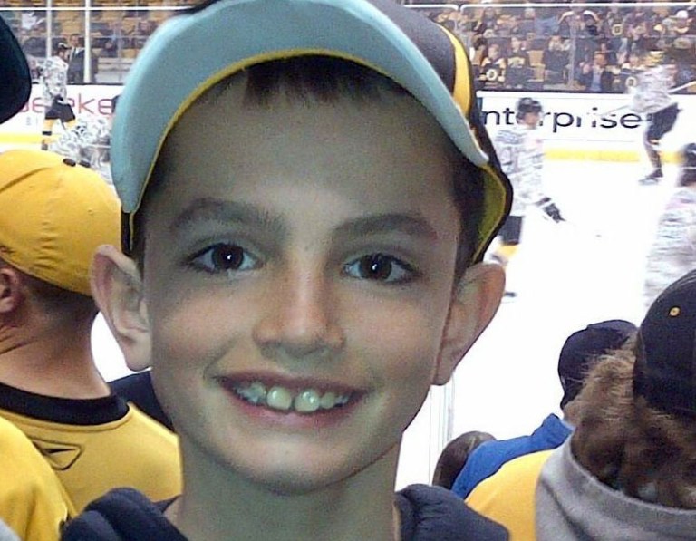 FILE - This undated photo provided by Bill Richard shows his son, Martin Richard, in Boston. Martin Richard, 8, was the youngest of three people killed in the explosions at the finish line of the Boston Marathon Monday, April 15, 2013. A private funeral Mass, followed by burial, was held with immediate family attending Tuesday, April 23, 2013, for Martin Richard. No other details were provided.(AP Photo/Bill Richard)