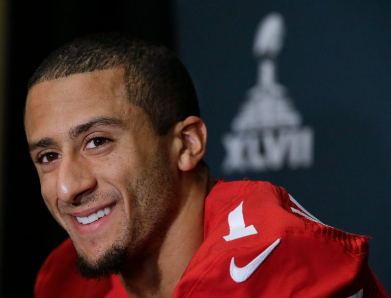San Francisco 49ers quarterback Colin Kaepernick talks with reporters on Thursday, Jan. 31, 2013, in New Orleans. The 49ers are scheduled to play the Baltimore Ravens in the NFL Super Bowl XLVII football game on Feb. 3. (AP Photo/Mark Humphrey)