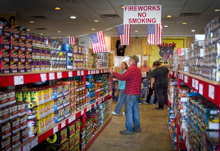  FILE - In this Friday, June, 28, 2013, file photo, people shop at Pyro City retail store, in Winslow, Maine. The government reports how much consumers spent and earned in June on Friday, Aug. 2, 2013. (AP Photo/Robert F. Bukaty, File)  