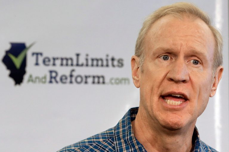 Illinois Republican gubernatorial candidate Bruce Rauner speaks with reporters during a term limits news conference Tuesday, Aug. 19, 2014, in Springfield, Ill. The clock is ticking for the possibility of Illinois voters getting to vote on term limits this year. An appeals court is due to rule on the measure's validity, and the issue is then expected to go to the state Supreme Court for a final decision before the ballot is certified next week. (AP Photo/Seth Perlman)