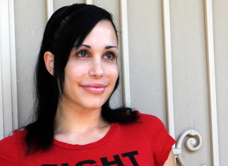 Nadya Suleman stands outside her home in La Habra, Calif. (AP/Damian Dovarganes)