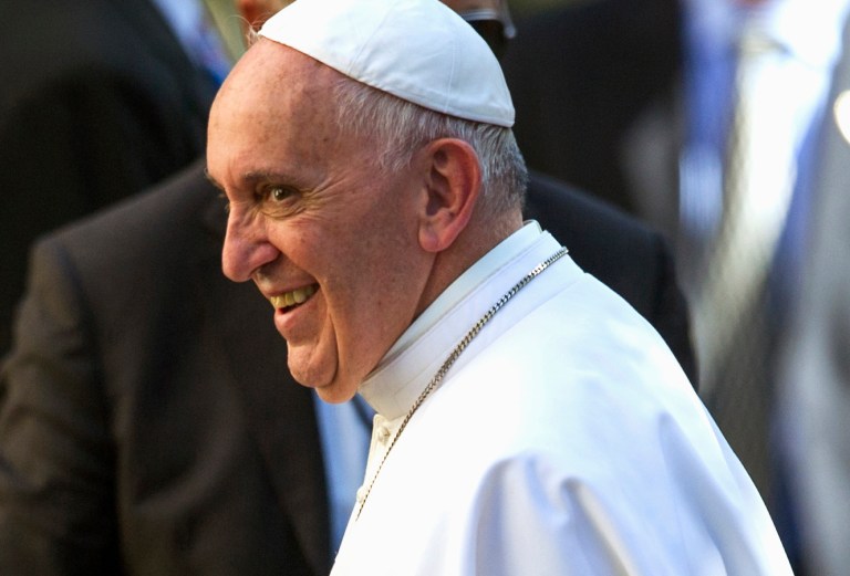 Pope Francis smiles as he arrives at the Apostolic Nunciature, the Vatican's diplomatic mission of Washington, Wednesday, Sept. 23, 2015. (AP Photo/Cliff Owen)