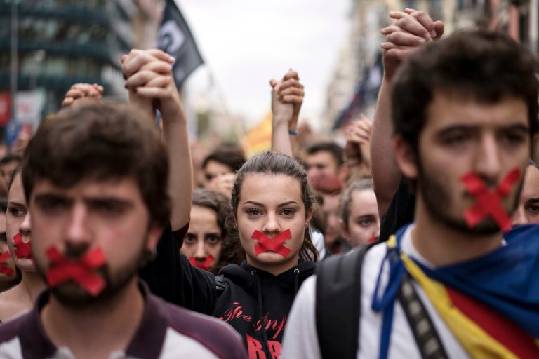 Independence supporters march during a demonstration downtown Barcelona, Spain, on Oct. 2. Catalan leaders accused Spanish police of brutality and repression while the Spanish government praised the security forces for behaving firmly and proportionately. Videos and photographs of the police actions were on the front page of news media outlets around the world. (AP Photo/Felipe Dana)