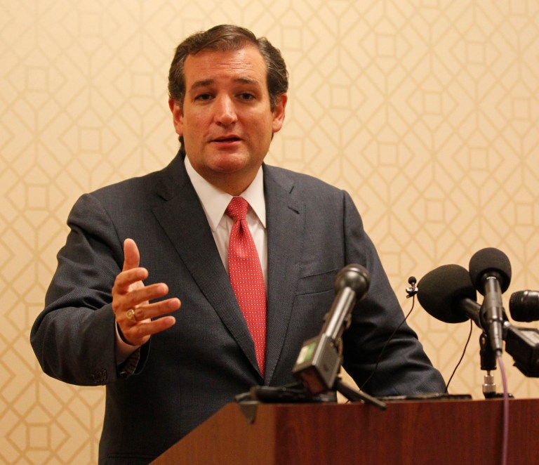 Sen. Ted Cruz talks to the media before he spoke with the Heritage Foundation, at the Hilton Anatole Hotel in Dallas, Texas on Tuesday, Aug, 20, 2013. He was there to discuss the push to remove funding for federal health care law, also called Obamacare. (AP Photo/The Dallas Morning News, Michael Ainsworth)