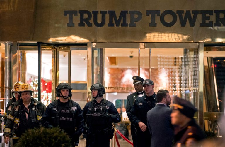 Aides to President-elect Donald Trump and New York City Mayor Bill de Blasio lashed out at each other on social media Tuesday night in a dispute over who ought to pay for the emergency responders who were dispatched to Trump Tower earlier in the day. (AP Photo/Craig Ruttle)