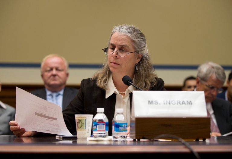 Sarah Hall Ingram, director of the Affordable Care Act Office at the Internal Revenue Service, looks over papers while testifying before theÃÂ House Committee on Oversight and Government Reform. (AP Photo/ Evan Vucci)