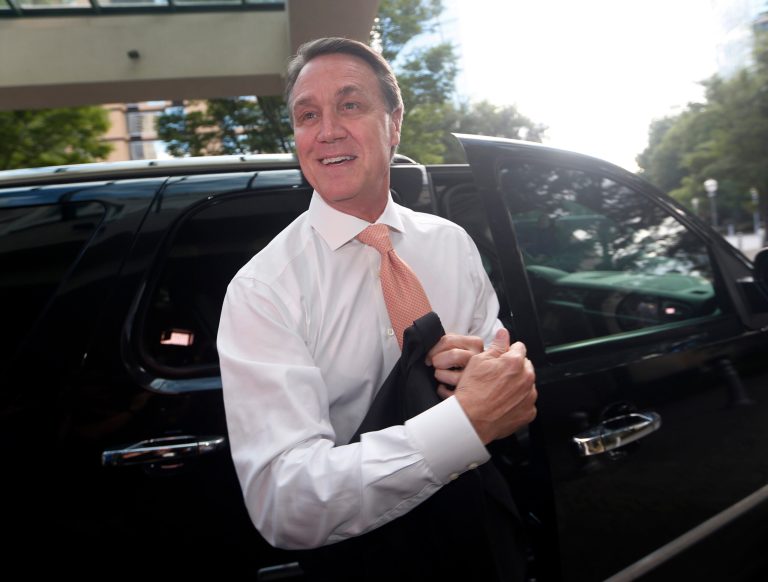 Public dissatisfaction with Washington and its elected officials was likely one factor that propelled Republican David Perdue to a narrow victory in Georgia on Tuesday. (AP Photo)