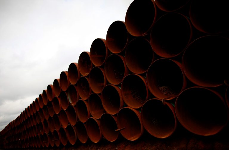 Pipe is stacked at the southern site of the Keystone XL pipeline on March 22, 2012, in Cushing, Okla. (Photo by Tom Pennington/Getty Images)