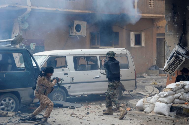Libyan military soldiers fire their weapons during clashes with Islamic extremist militias in Benghazi, Libya, Thursday, Oct. 30, 2014. (AP)