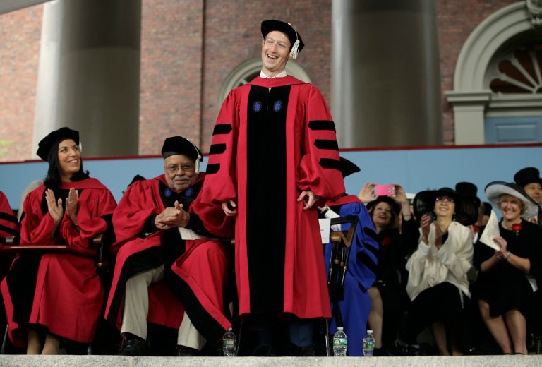 Facebook CEO and Harvard dropout Mark Zuckerberg is introduced before being presented with an honorary Doctor of Laws degree during Harvard University commencement exercises on Thursday in Cambridge, Mass. (AP Photo/Steven Senne)