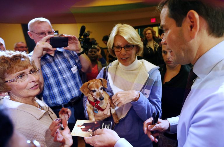 One voter who didn't like Marco Rubio because of insufficient experience preferred neurosurgeon Ben Carson. Another one raved about Rubio's performance at a town hall meeting. (AP Photo)