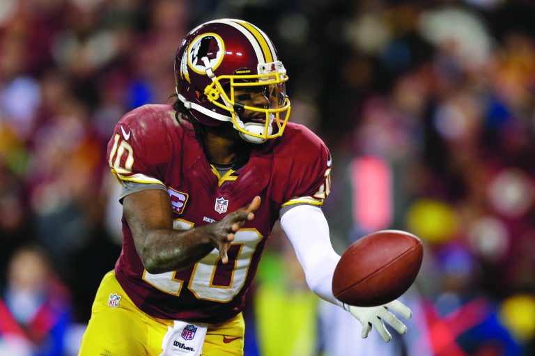 Evan Vucci/AP
Robert Griffin III tweeted that he wouldn't compromise his career in an attempt to make it back from injury by Week 1.