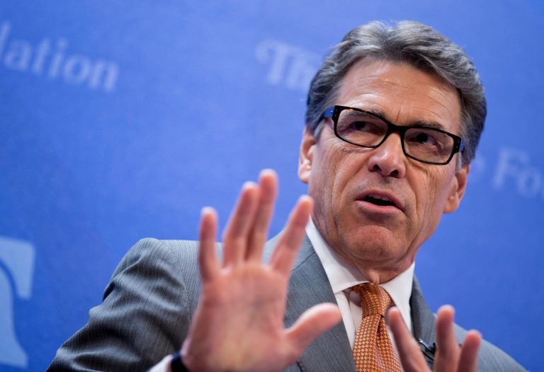 Texas Gov. Rick Perry speaks at the Heritage Foundation in Washington, Thursday, Aug. 21, 2014, about he would be open to sending U.S. combat forces to Iraq to fight the deadly Islamic State after its attacks on a Christian minority and the beheading of an American journalist. (AP Photo/Manuel Balce Ceneta)