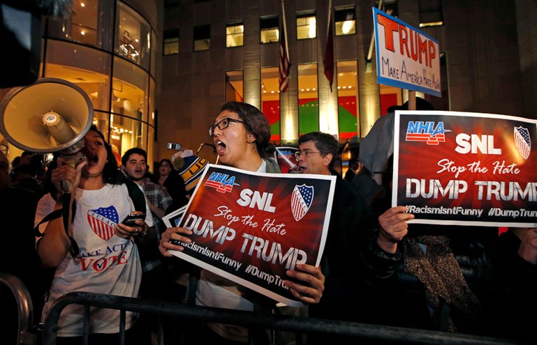 Protesters opposed to the appearance of Republican presidential candidate Donald Trump's appearance as a guest host on this weekend's 