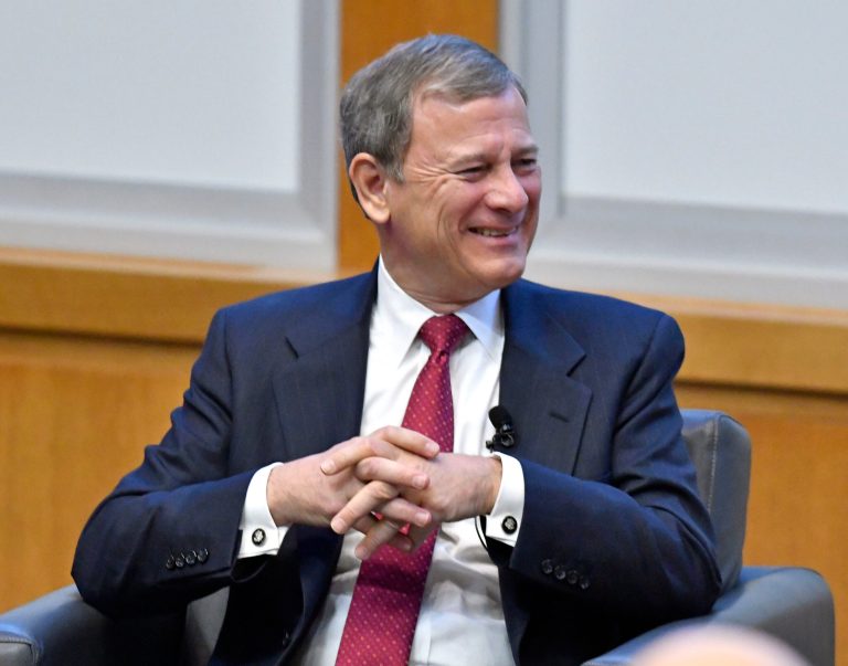 Chief Justice John Roberts sold up to $500,000 worth of Microsoft stock, a practice watchdog groups are praising as justices shed shares of companies. (AP Photo/Timothy D. Easley)