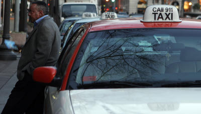 Cabs in the District will soon be equipped with credit card machines, GPS technology and NBC television monitors. (Examiner file photo)