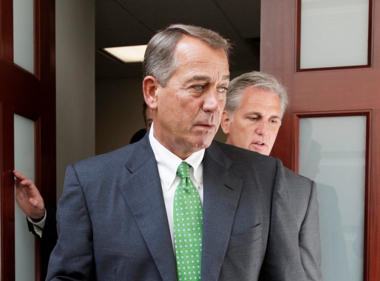 House Speaker John Boehner of Ohio, left, followed by House Majority Leader Kevin McCarthy of Calif., emerge from a meeting on Capitol Hill in Washington. (AP Photo/J. Scott Applewhite, File)