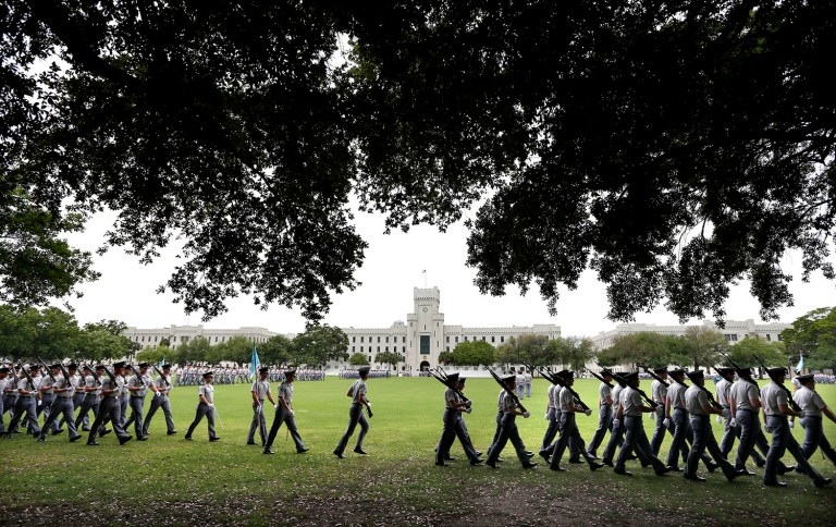 The Citadel is known for its strict, button-up uniforms that its cadets are mandated to wear nearly all of the time. The school has a 35-page booklet of rules and regulations. (AP Photo/Mic Smith, File)