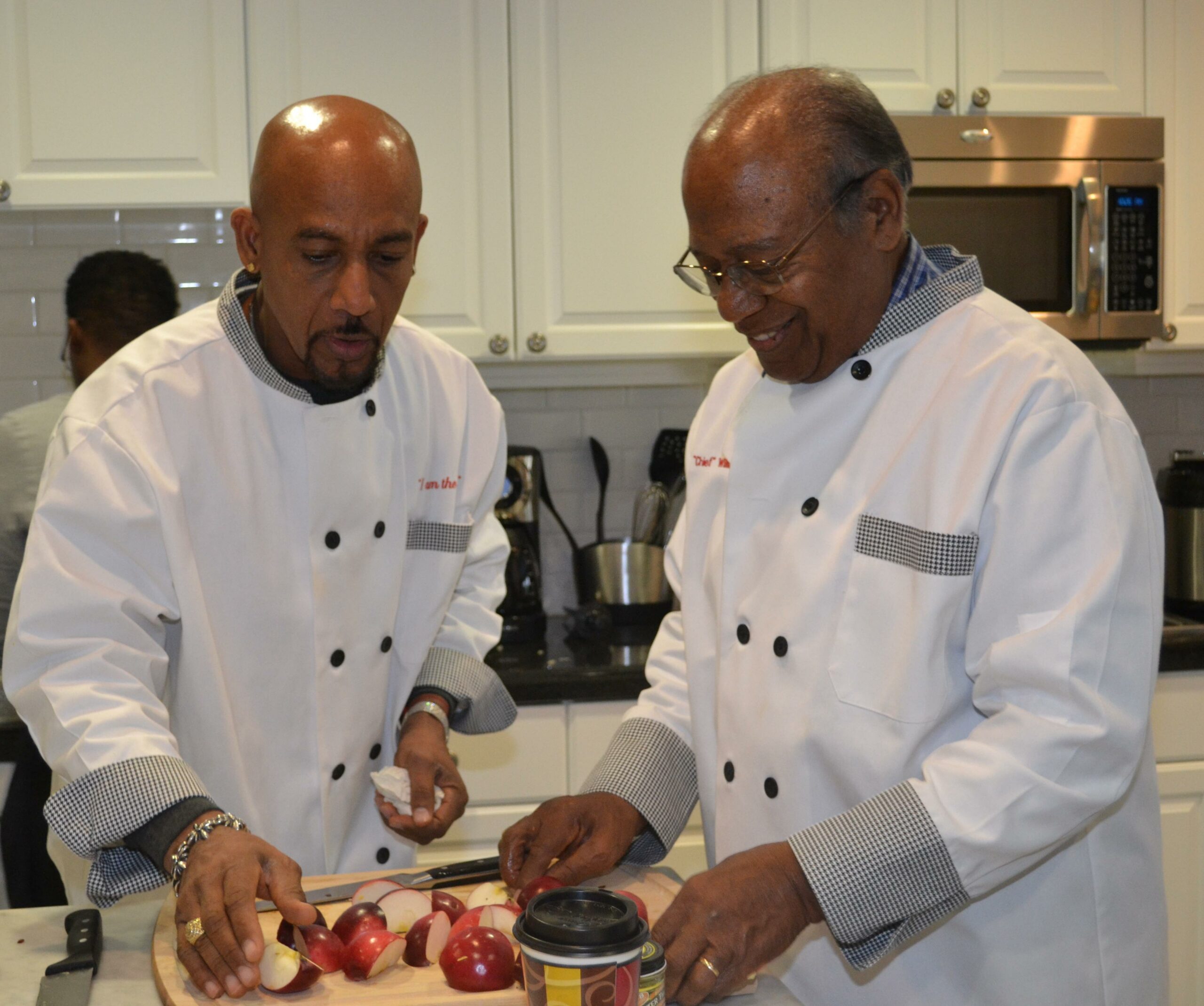 Montel Williams serves it up for troops as Fisher House