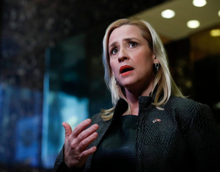 In this Thursday, Nov. 17, 2016, file photo, Arkansas Attorney General Leslie Rutledge speaks to media at Trump Tower, in New York. A coalition of Democratic state attorneys general has unleashed a torrent of litigation they argue is necessary to protect their citizens from a Trump administration that too often ignores the law. Rutledge, who chairs the Republican Attorneys General Association, said she's increasingly concerned that her Democratic colleagues are 
