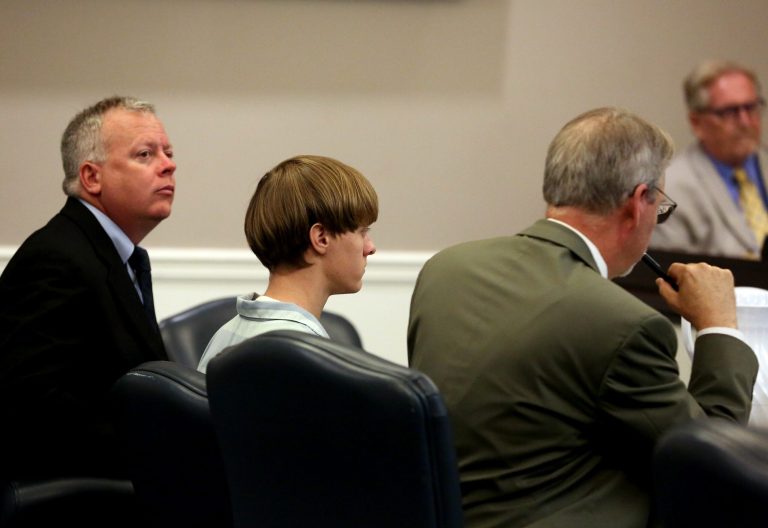 Mother of the self-avowed wife supremacist who is accused of gunning down nine black parishioners collapsed. (Grace Beahm/The Post and Courier via AP, Pool