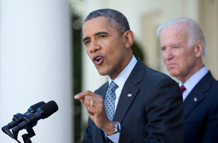 President Barack Obama , accompanied by Vice President Joe Biden speaks about the Affordable Care Act, Tuesday, April 1, 2014, in the Rose Garden of the White House in Washington. (AP Photo/Manuel Balce Ceneta)