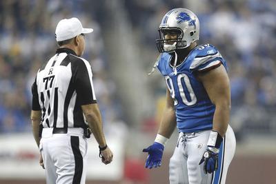 Gregory Shamus/Getty Images
Ndamukong Suh was ejected from the Lions'loss to the Packers on Thursday after stomping on the arm of Evan Dietrich-Smith.