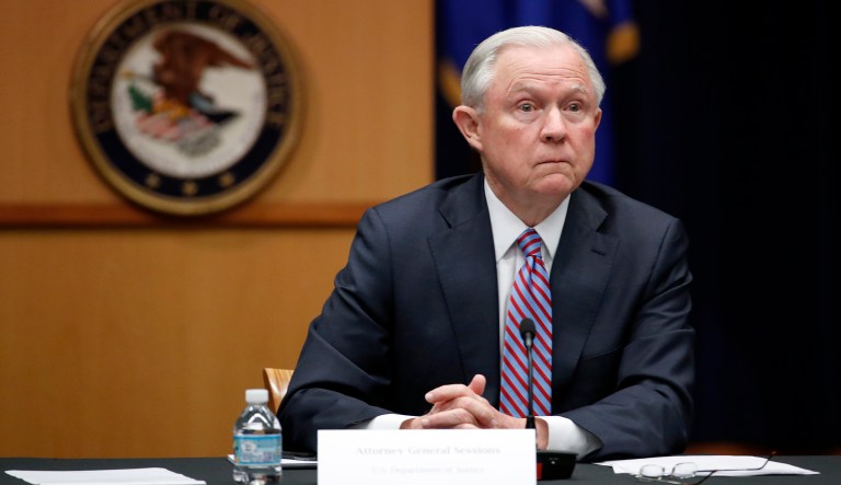A protester projected a message on the Justice Department building Thursday night protesting against Attorney General Jeff Sessions. (AP Photo/Alex Brandon, File)