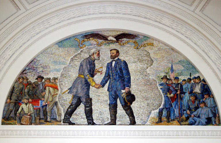 Gen. Robert E. Lee, left, surrenders to Gen. Ulysses S. Grant, ending the Civil War, in this painting on a frieze at Grant's Tomb, shown June 24, 2004, in New York. (AP Photo)Â 