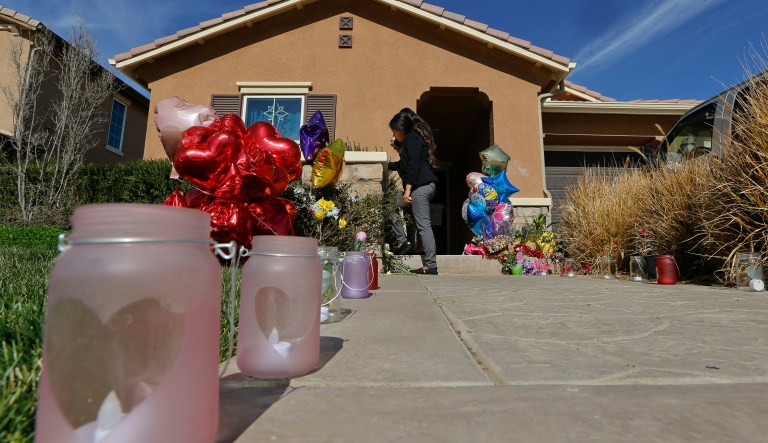 A silver lining to this horror story is that perhaps it will prompt people to be more attentive to those around them, to take the time to chat with their neighbors without feeling like they're prying into their lives. (AP Photo/Damian Dovarganes)
