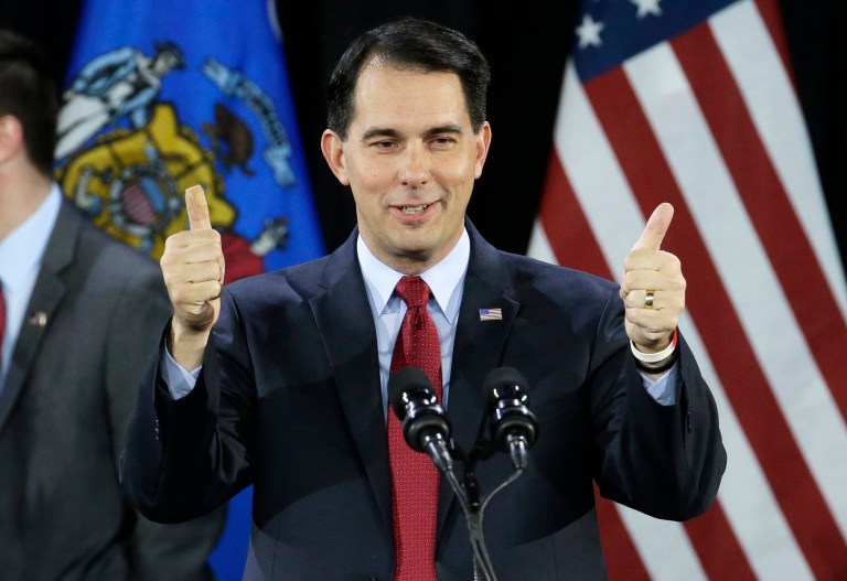 In a Tuesday, Nov. 4, 2014 file photo, Wisconsin Republican Gov. Scott Walker gives a thumbs up as he speaks at his campaign party, in West Allis, Wis. (AP Photo/Morry Gash, File)