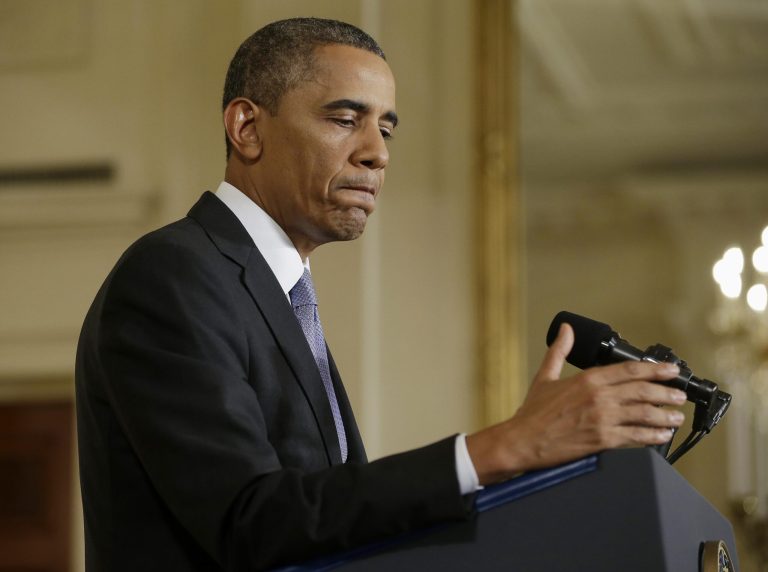   President Barack Obama pauses during his news conference in the East Room of the White House in Washington, Friday, Aug. 9, 2013. The president said he'll work with Congress to change the oversight of some of the National Security Agency's controversial surveillance programs and name a new panel of outside experts to review technologies.(AP Photo/Pablo Martinez Monsivais)  