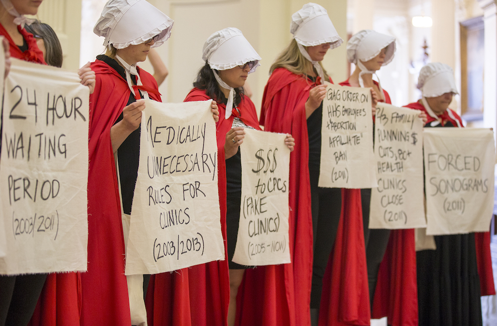 Why Are Women Dressing Up Like Offred From The Handmaid’s Tale?