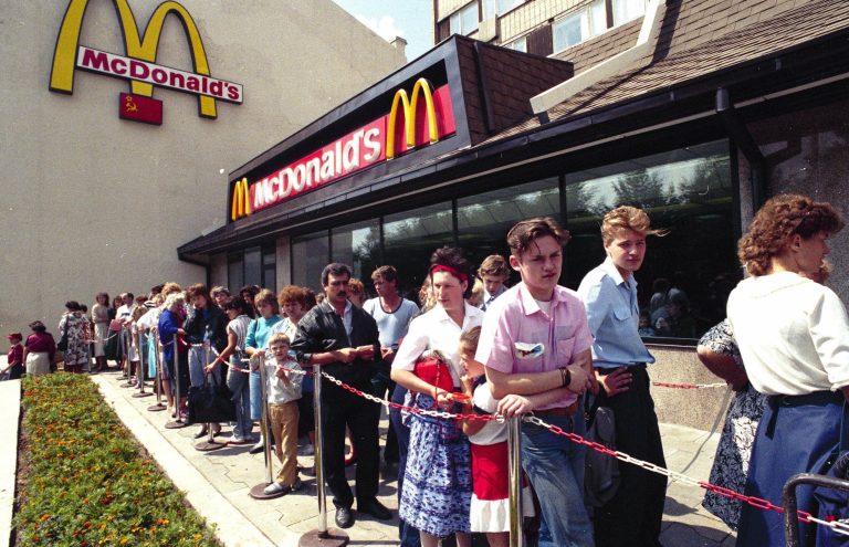FILE  - In this file photo taken in 1991, Russians wait in line outside a McDonald's fast food restaurant in Moscow. Russian news agencies reported Thursday, Aug. 21, 2014, that the country's food safety agency will conduct checks on McDonald's restaurants in the Urals following food safety complaints, a day after four branches of the chain were shuttered in Moscow. (AP Photo)