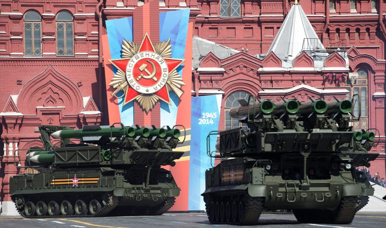 A Russian Buk-M2 missile system moves along Red Square during the Victory Day Parade, which commemorates the 1945 defeat of Nazi Germany in Moscow on Friday, May 9, 2014. (AP Photo/Pavel Golovkin)