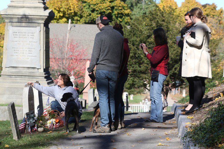 Local news reports indicate at least 1,000 people made the journey to the Rochester, N.Y., grave site to pay tribute to Susan B. Anthony's contributions to women's rights. (AP Photo)