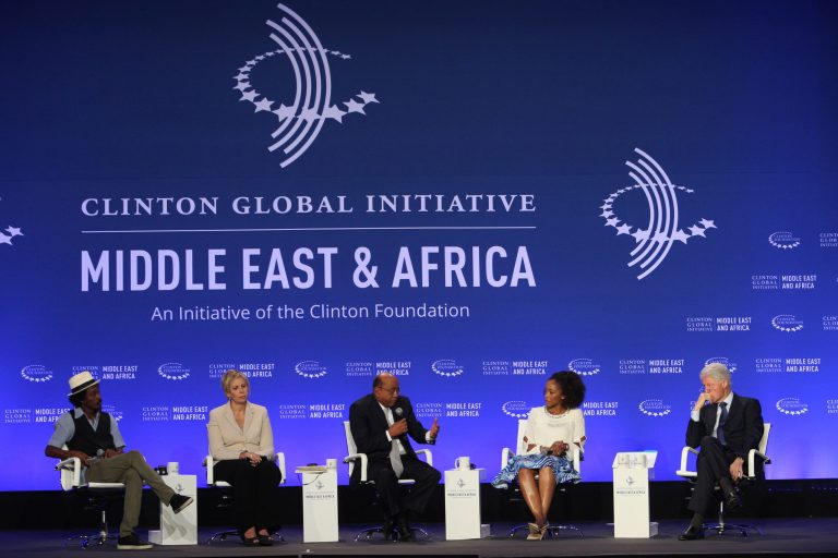 Former U.S President Bill Clinton, right, listens during a plenary session Connecting People for Growth at the Clinton Global Initiative Middle East & Africa meeting in Marrakech, Morocco, Wednesday May 6, 2015. From left to right are K'naan Warsame, Nezha Hayat, member of the management board, Societe Generale Maroc, Mo Ibrahim, founder and chair, Mo Ibrahim Foundation, Phuti Mahanyele, CEO, Shanduka Group Ltd., and Former President Bill Clinton. (AP Photo/Abdeljalil Bounhar)