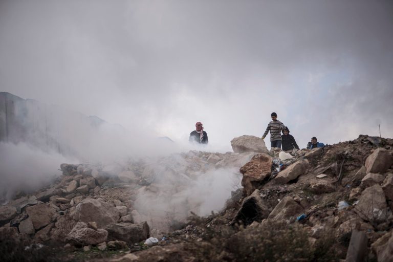 Palestinian youths and the Israeli army clash at the Kalandia checkpoint on November 21, 2014, Israel. (Ilia Yefimovich/Getty Images)