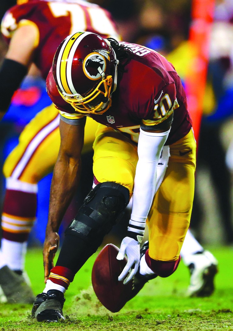 Al Bello/Getty Images
Robert Griffin III needed to have his ACL reconstructed and his LCL repaired after reinjuring his knee against the Seahawks.