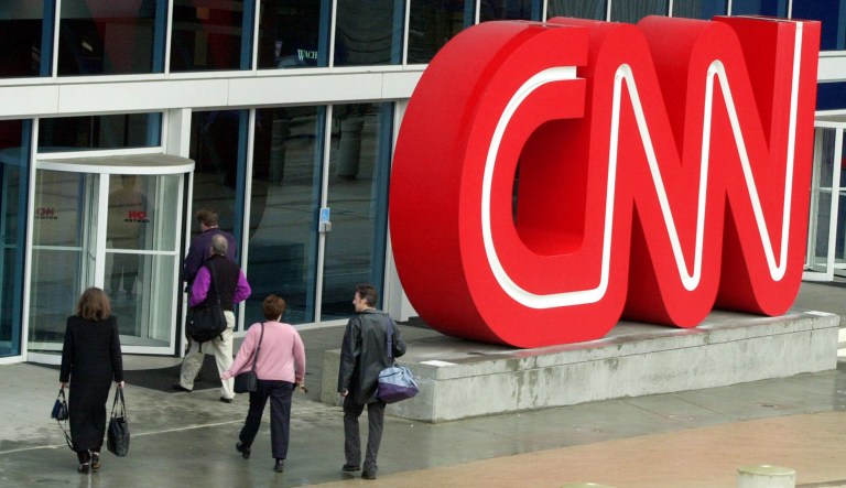 A Justice Department official said late Wednesday that AT&T proposed selling off CNN and other properties in a meeting with officials on Monday. AT&T, however, said in a statement that it did not do so. (AP Photo/Ric Feld, File)