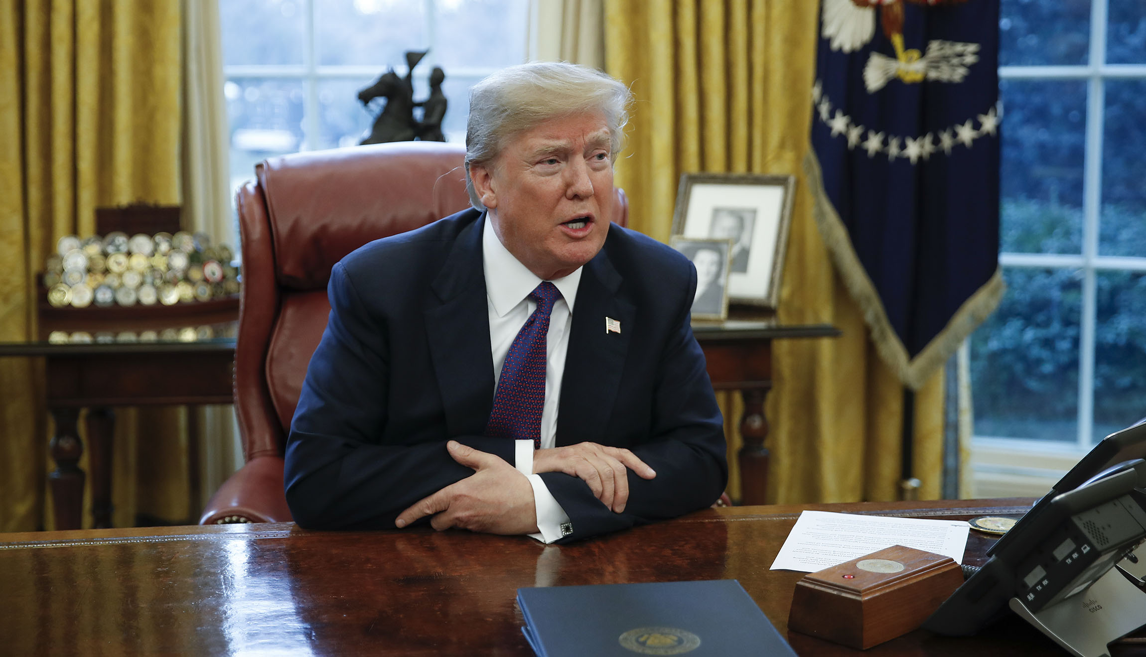 Trump threatens EU with auto tariffs