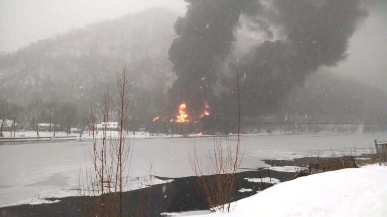 Fire burns at the scene of a train derailment, near Mount Carbon, W.Va., on Feb. 16. Fires burned for nearly nine hours after the train carrying more than 100 tankers of crude oil derailed in a snowstorm. (AP Photo/WCHS-TV)